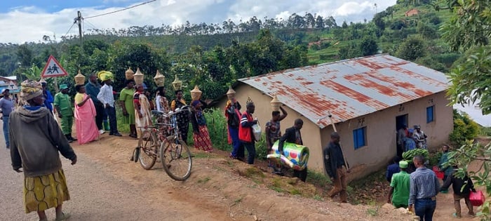 What is being done to support the families of the Tutsi genocide survivors? The population is still doing it