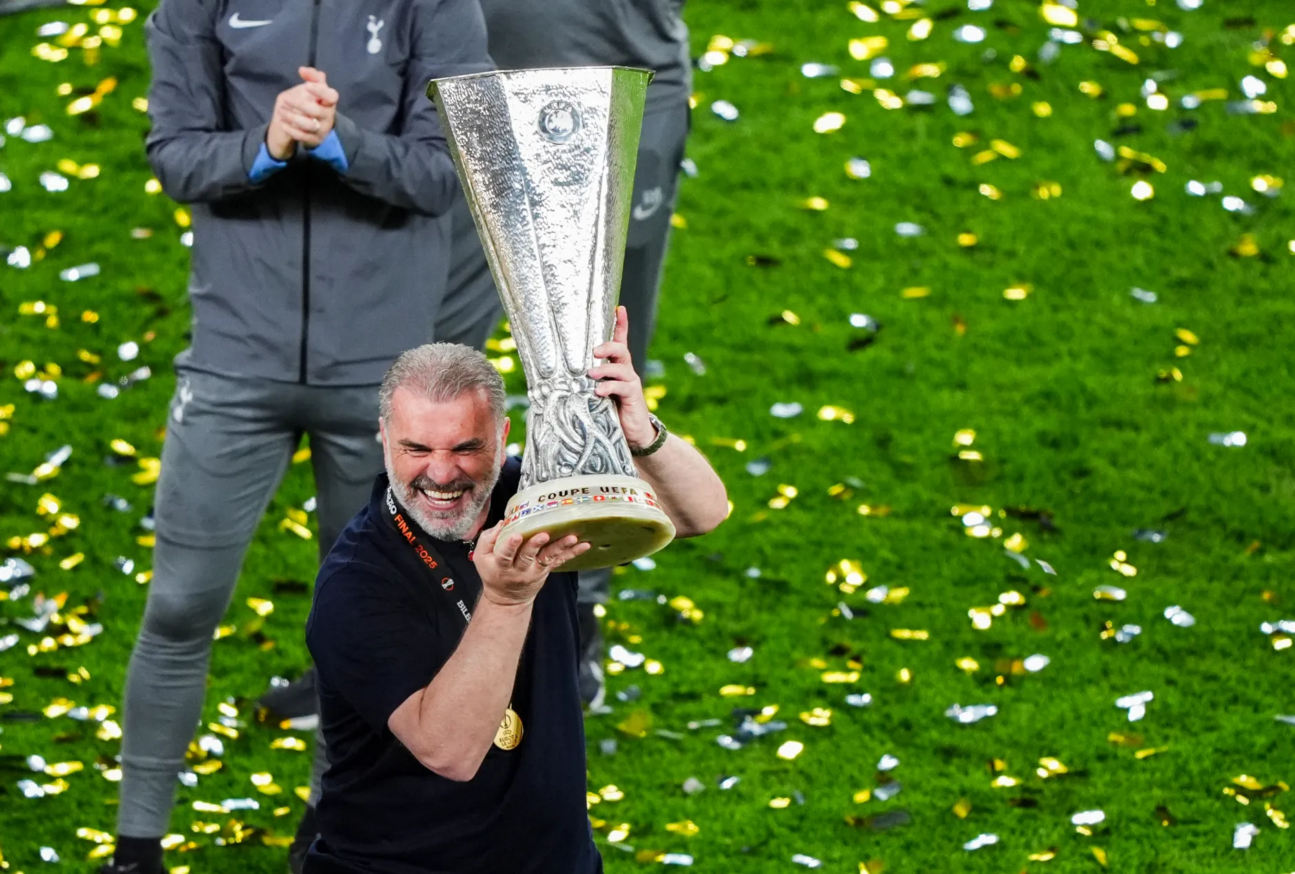 Postecoglou with his second-season trophy - the one he always wins